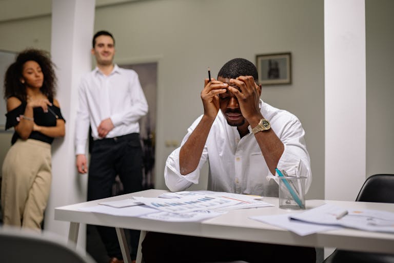 Adult struggling with focus showing common signs of adult ADHD