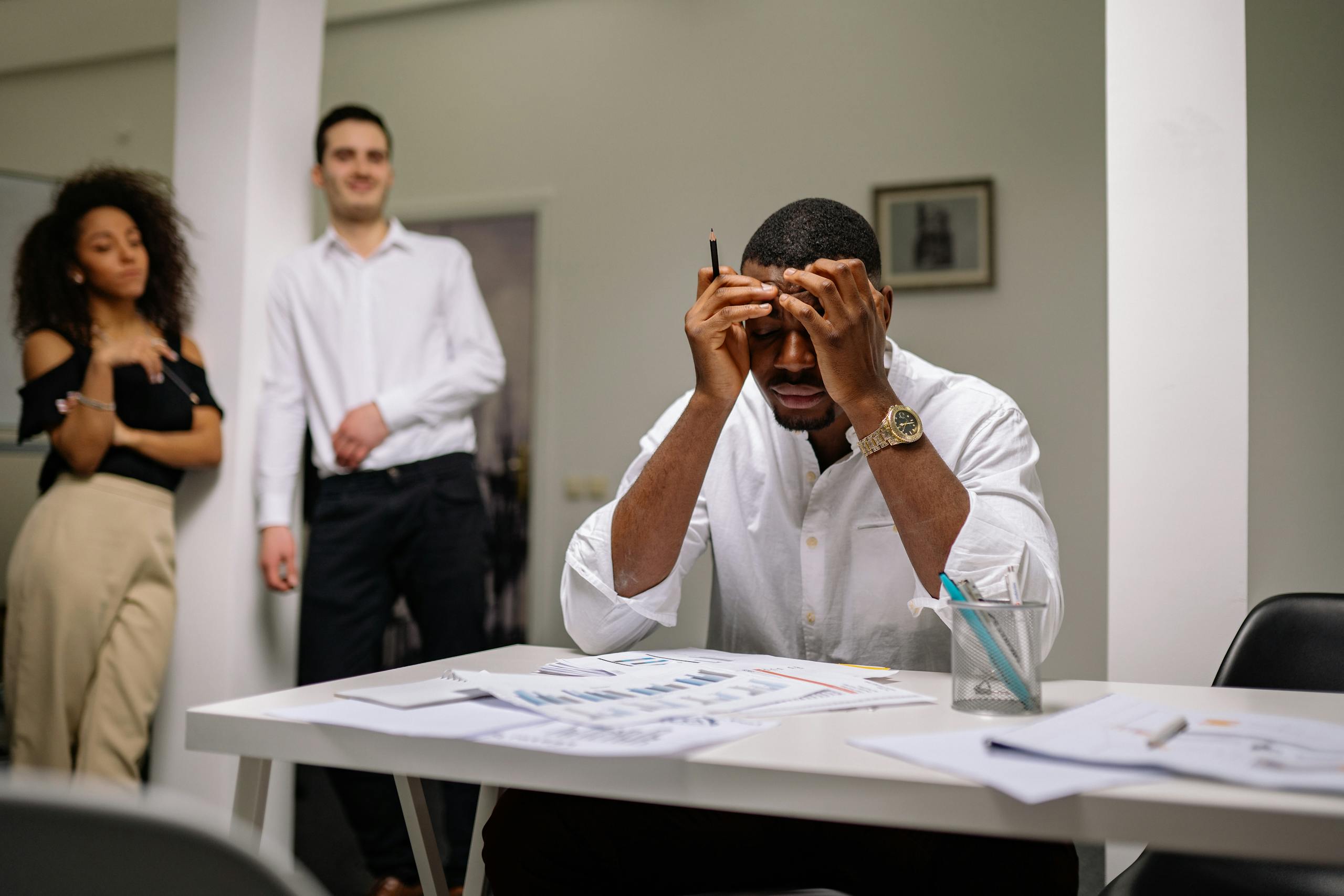 Adult struggling with focus showing common signs of adult ADHD