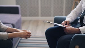 Maryland psychiatrist meeting with a patient to discuss whether psychiatrists do therapy
