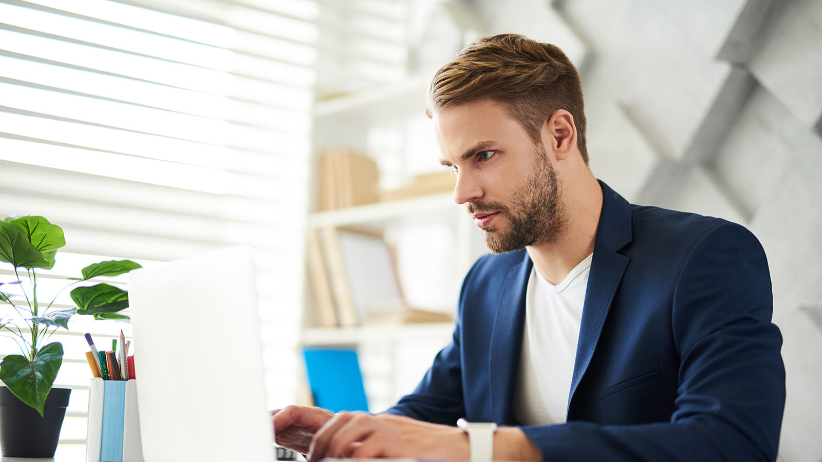 Adult concentrating at a desk, the sustained all-day focus non-stimulant ADHD medication aims to support