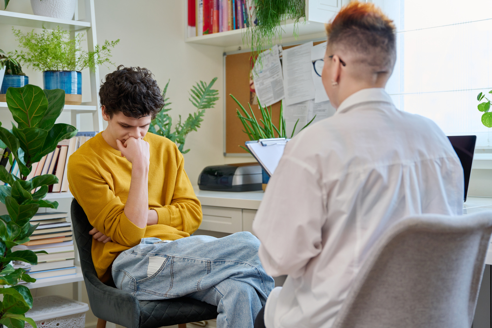 Adult patient talking with a CareFirst psychiatrist during a first psychiatric evaluation