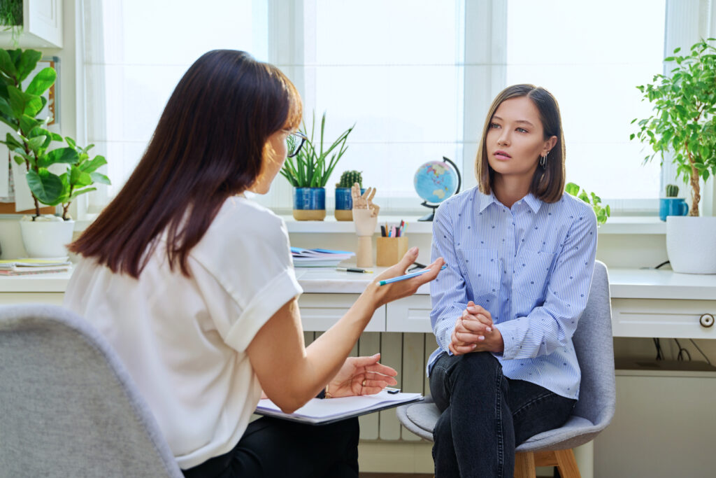 Clinician reviewing treatment history with a patient during an evaluation for ketamine therapy in Maryland