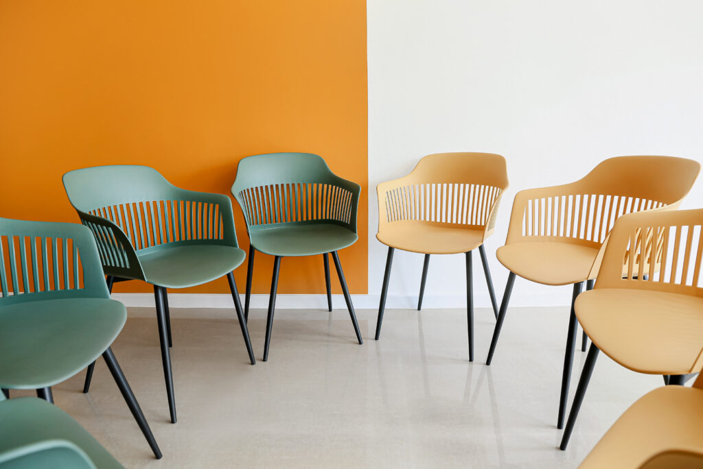Empty chairs arranged for a community mental health support group in Montgomery County